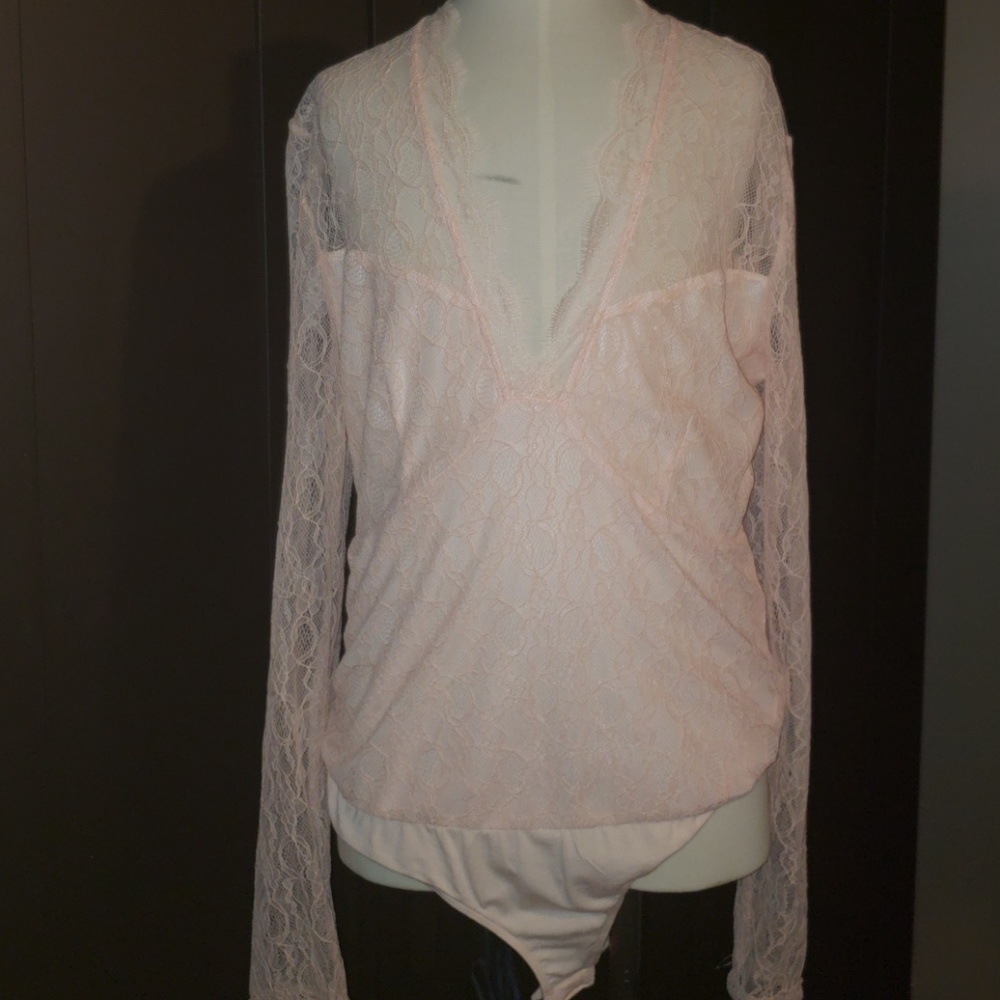 Eva Mendes - New York & Company pink bodysuit